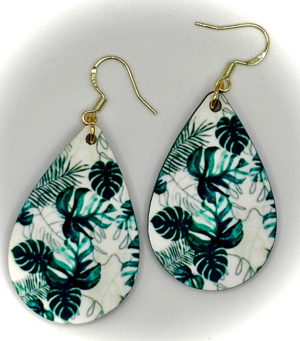 Stunning Monstera Plant Dangle Earrings with Exquisite Detailing on Both Sides.