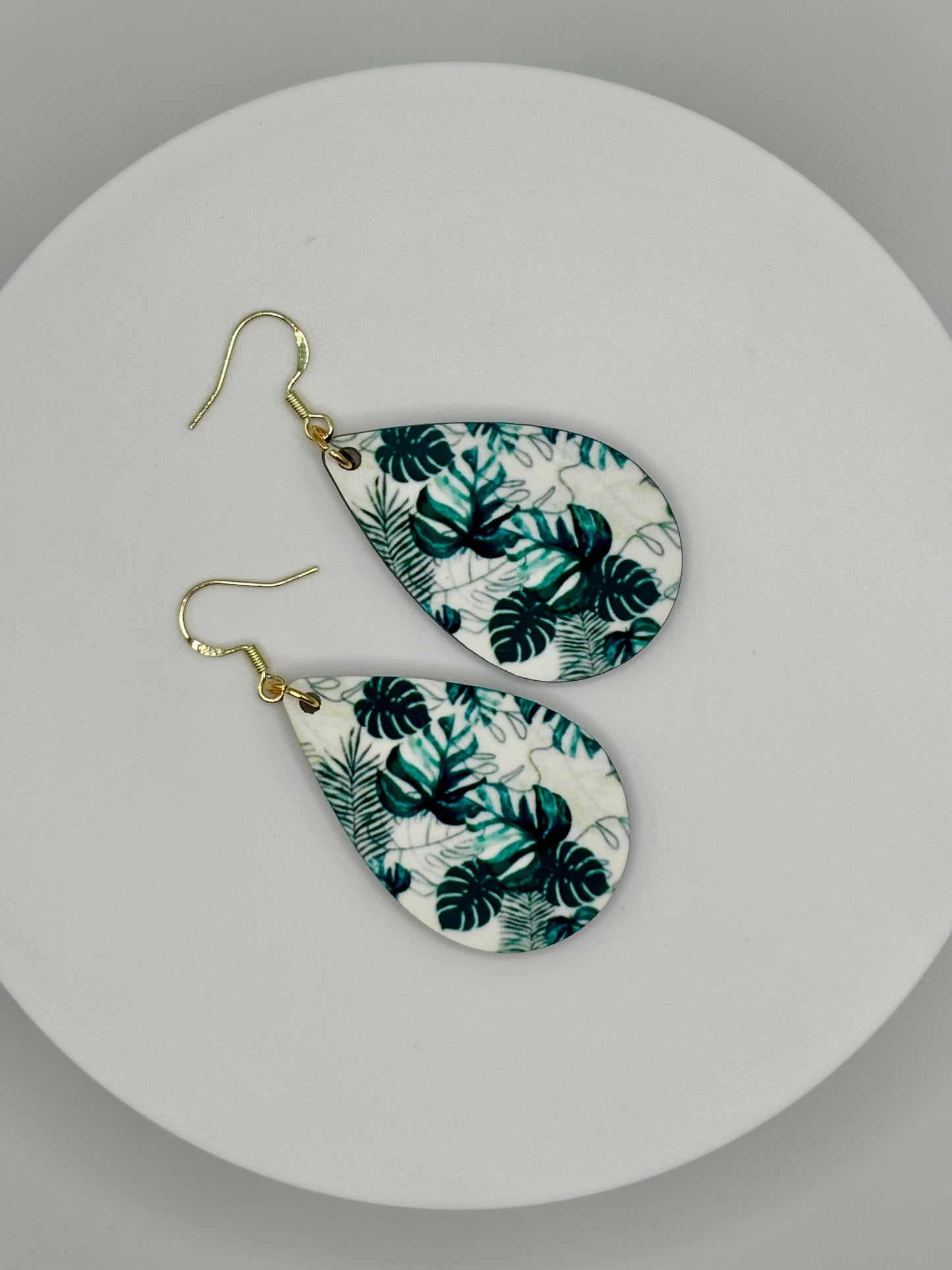 Stunning Monstera Plant Dangle Earrings with Exquisite Detailing on Both Sides.
