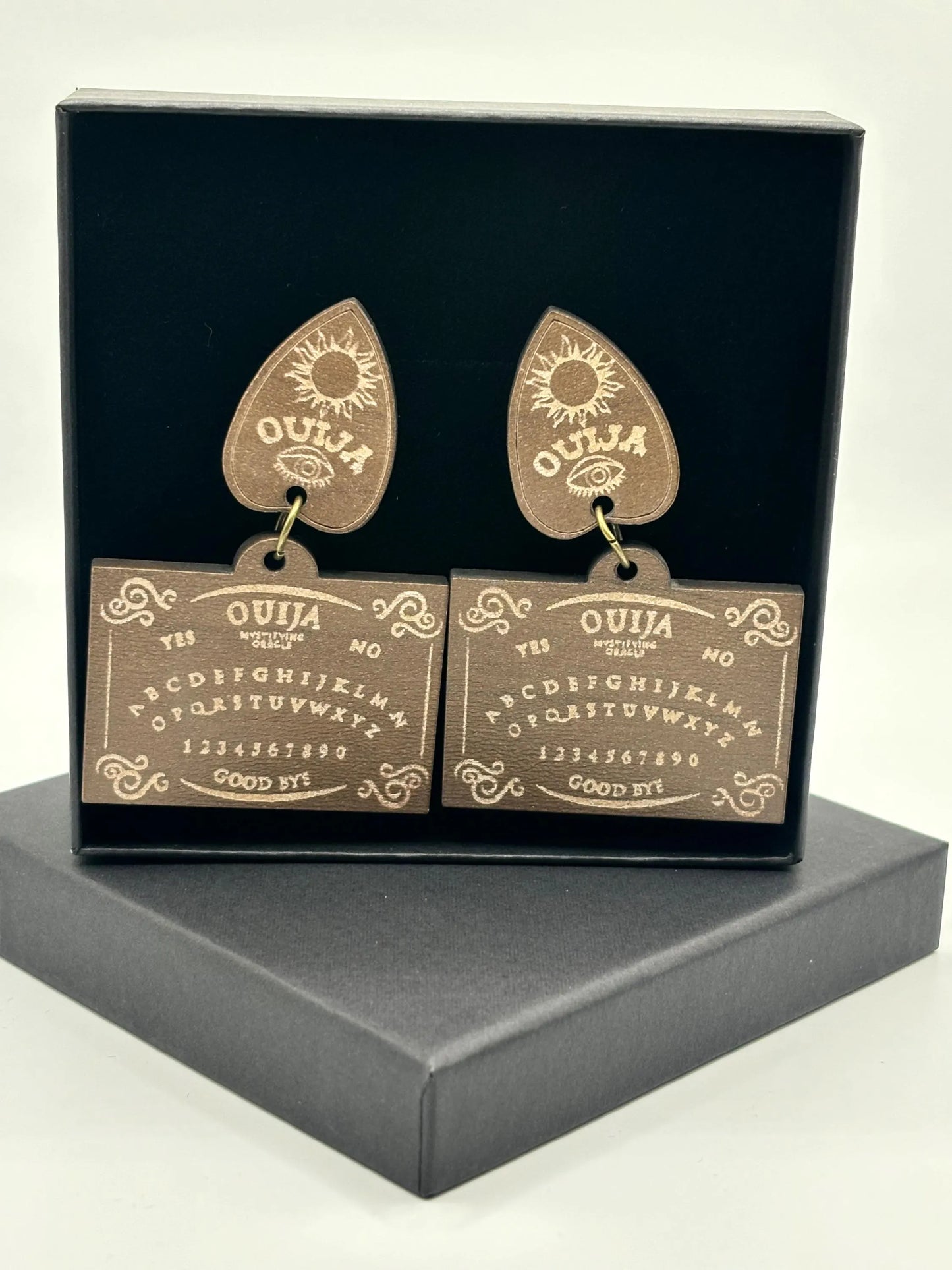 Channel the Other Side with these Spirit Board Earrings for Halloween